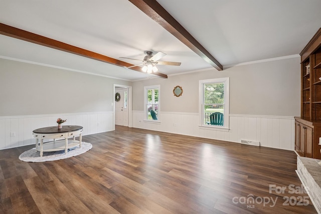 10206 Washam Potts Rd, Cornelius, NC 28031 - unfurnished living room with beam ceiling, ceiling fan, a wainscoted wall, and wood finished floors