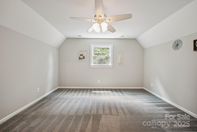 10206 Washam Potts Rd, Cornelius, NC 28031 - additional living space featuring vaulted ceiling, carpet, and a ceiling fan