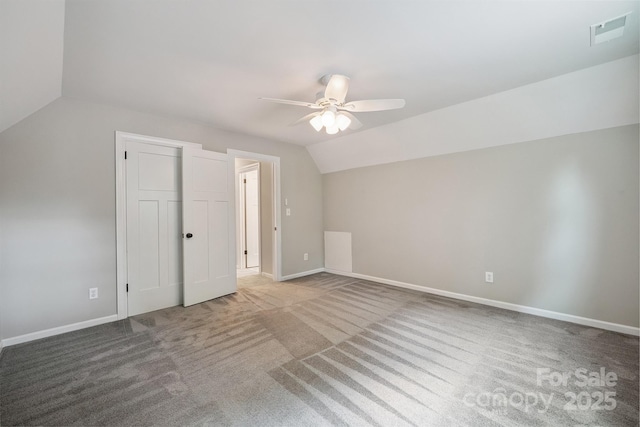 10206 Washam Potts Rd, Cornelius, NC 28031 - additional living space with vaulted ceiling, carpet floors, and ceiling fan