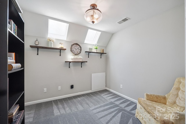 10206 Washam Potts Rd, Cornelius, NC 28031 - living area featuring a skylight, carpet floors, and vaulted ceiling
