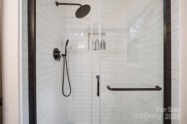 10206 Washam Potts Rd, Cornelius, NC 28031 - bathroom featuring a stall shower
