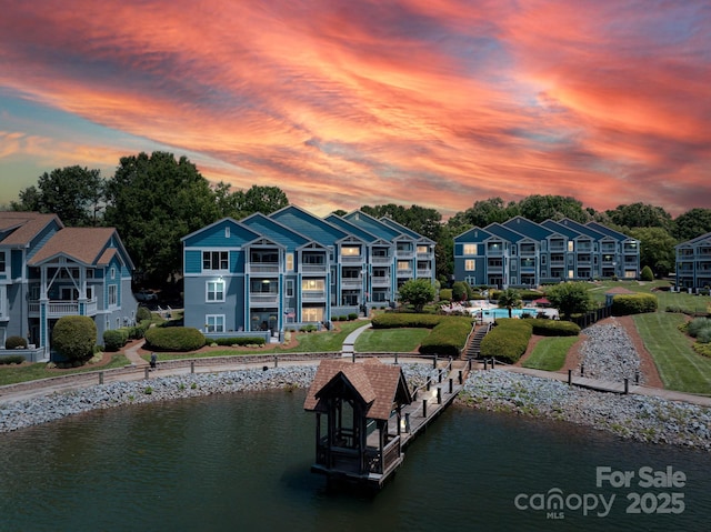 1018 SW Dr SW Unit 18, Davidson, NC 28036 - dock area featuring a water view, boat lift, and a yard