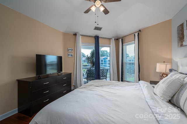 1018 SW Dr SW Unit 18, Davidson, NC 28036 - bedroom with access to outside, vaulted ceiling, wood finished floors, and ceiling fan