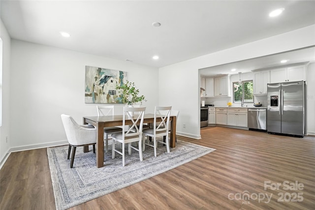 2705 Lowell Bethesda Rd, Gastonia, NC 28056 - dining area with wood finished floors and recessed lighting
