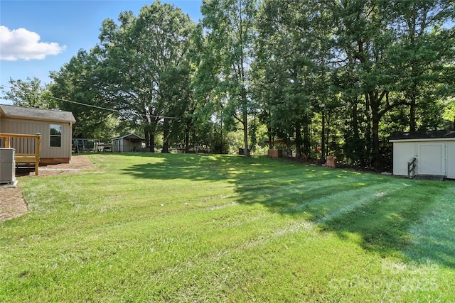 2705 Lowell Bethesda Rd, Gastonia, NC 28056 - view of green lawn with a storage unit