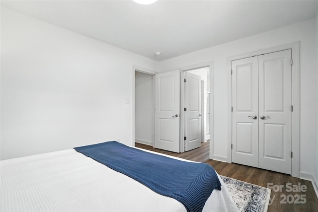 2705 Lowell Bethesda Rd, Gastonia, NC 28056 - bedroom with dark wood-style floors and a closet