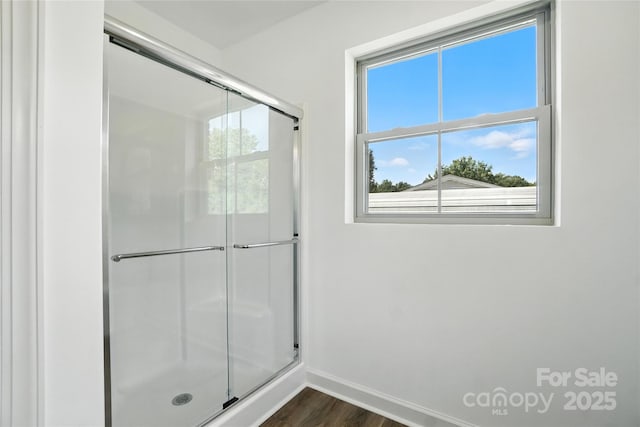 2705 Lowell Bethesda Rd, Gastonia, NC 28056 - bathroom featuring a shower stall and wood finished floors