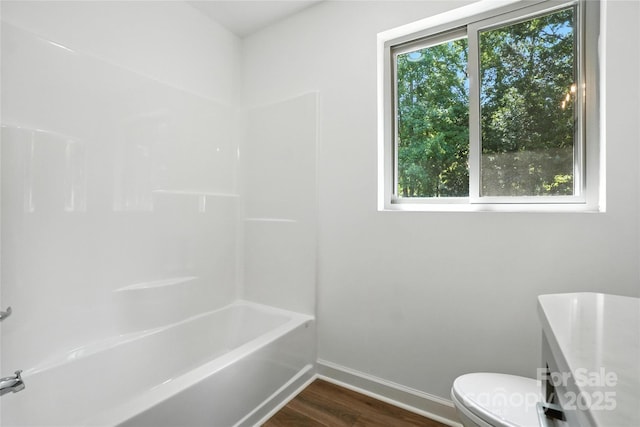 2705 Lowell Bethesda Rd, Gastonia, NC 28056 - bathroom featuring wood finished floors and washtub / shower combination