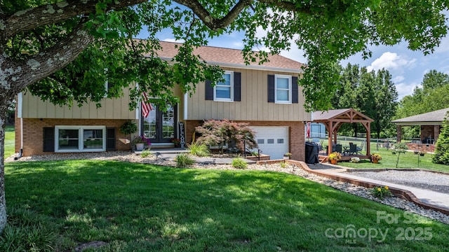3651 16th St NE, Hickory, NC 28601 - raised ranch featuring an attached garage, brick siding, a gazebo, and a front yard