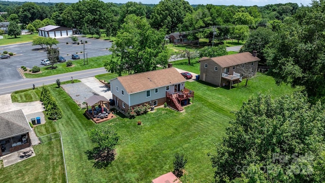 3651 16th St NE, Hickory, NC 28601 - aerial view of property and surrounding area featuring a heavily wooded area