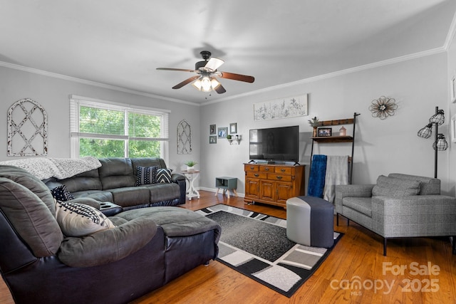 3651 16th St NE, Hickory, NC 28601 - living area featuring a ceiling fan, wood finished floors, and crown molding