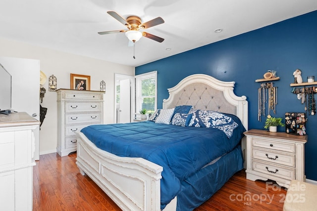 3651 16th St NE, Hickory, NC 28601 - bedroom with wood finished floors and ceiling fan