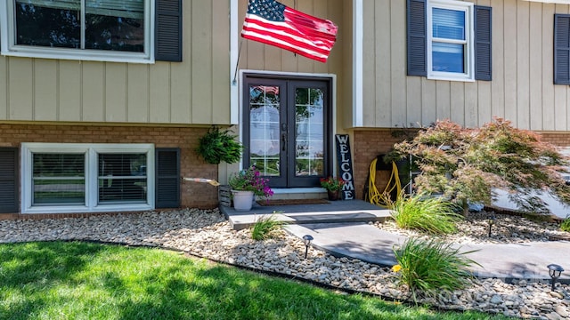 3651 16th St NE, Hickory, NC 28601 - property entrance featuring french doors and brick siding