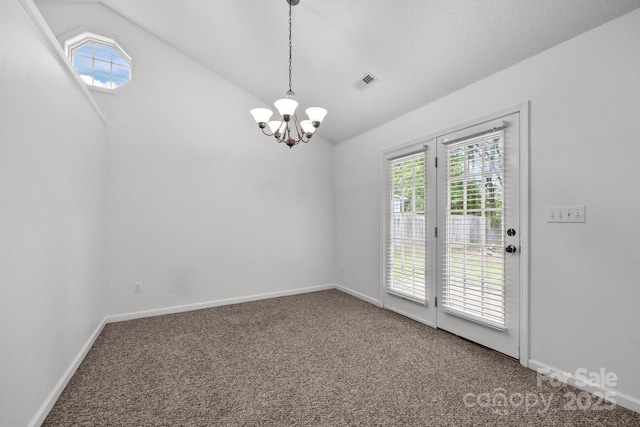 385 Glensprings Dr Unit 269, Fletcher, NC 28732 - carpeted empty room featuring vaulted ceiling and a chandelier