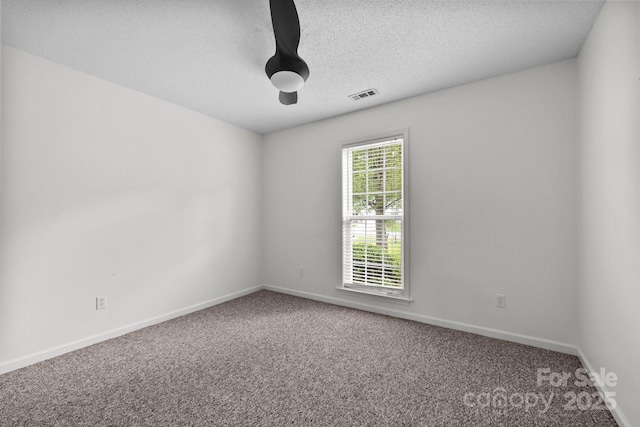 385 Glensprings Dr Unit 269, Fletcher, NC 28732 - carpeted empty room with baseboards and a textured ceiling