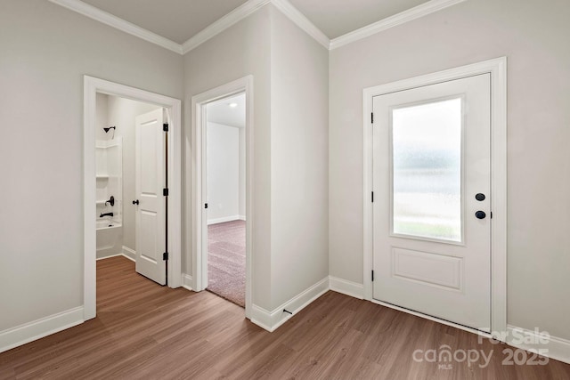 7106 Jerimoth Dr, Charlotte, NC 28215 - foyer entrance featuring wood finished floors and ornamental molding