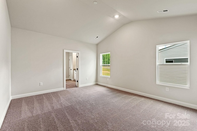 7106 Jerimoth Dr, Charlotte, NC 28215 - empty room with carpet flooring and vaulted ceiling