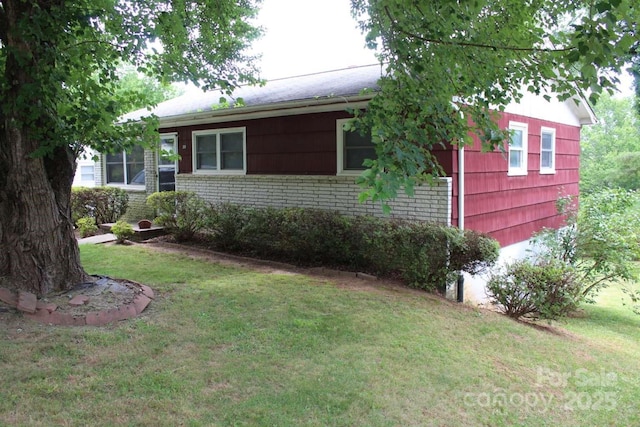 50 Huffman Rd, Asheville, NC 28806 - view of front of house featuring a front lawn and brick siding