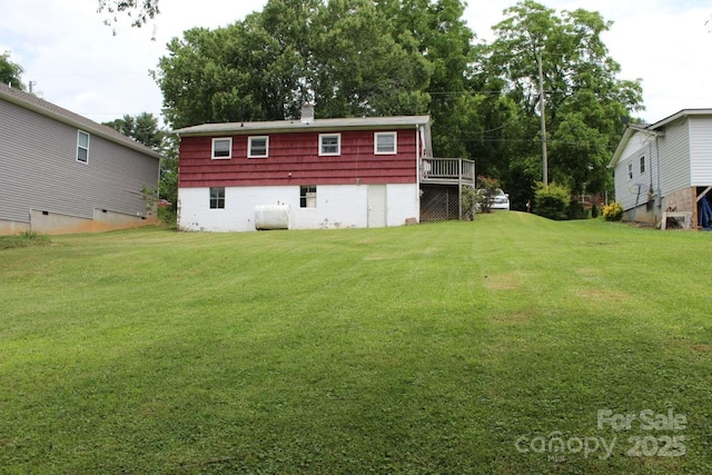 50 Huffman Rd, Asheville, NC 28806 - view of green lawn with oil tank and a wooden deck