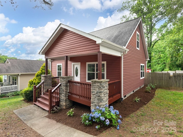 78 W Chapel Rd, Asheville, NC 28803 - view of front facade featuring roof with shingles and covered porch