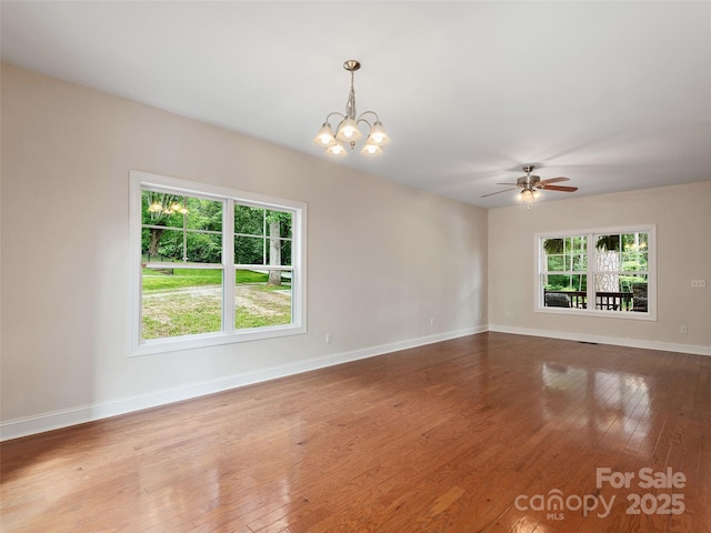 78 W Chapel Rd, Asheville, NC 28803 - spare room featuring hardwood / wood-style flooring, a chandelier, and ceiling fan