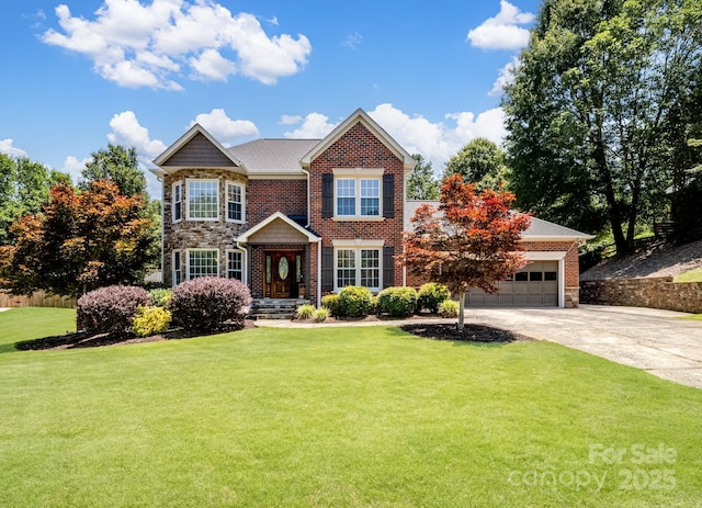 165 Cottontail Ln SE, Concord, NC 28025 - traditional-style house featuring a front yard, driveway, a garage, and stone siding