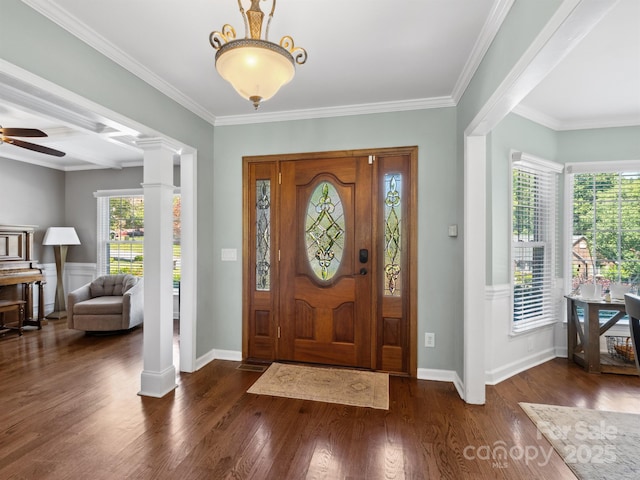 165 Cottontail Ln SE, Concord, NC 28025 - foyer featuring wood finished floors, ornamental molding, ceiling fan, and ornate columns