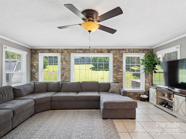 165 Cottontail Ln SE, Concord, NC 28025 - living room with light tile patterned floors, ornamental molding, a textured ceiling, and a ceiling fan