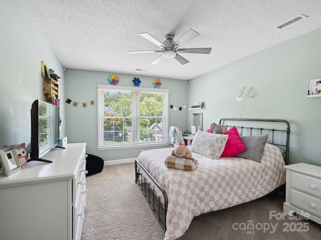 165 Cottontail Ln SE, Concord, NC 28025 - bedroom featuring carpet, a textured ceiling, and ceiling fan
