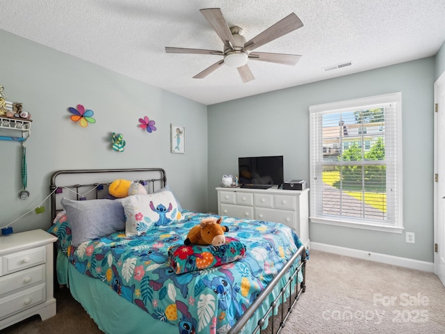 165 Cottontail Ln SE, Concord, NC 28025 - bedroom featuring carpet flooring, a textured ceiling, and a ceiling fan