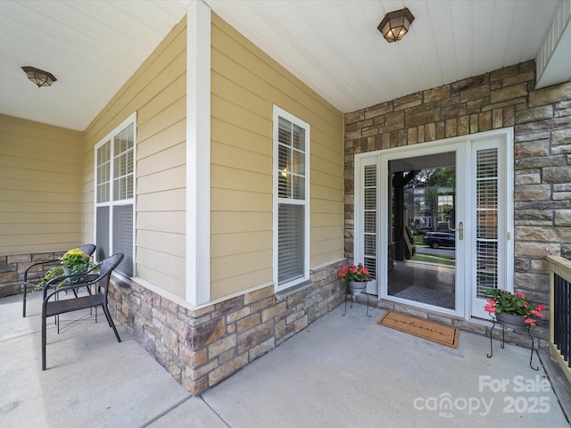 1808 Mill Chase Ln, Waxhaw, NC 28173 - property entrance featuring stone siding and a porch