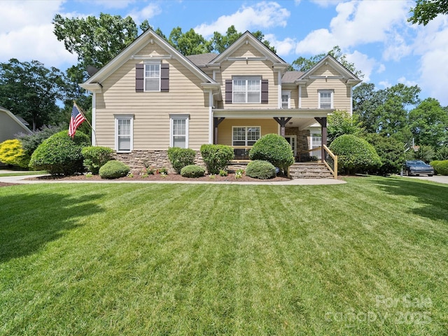 1808 Mill Chase Ln, Waxhaw, NC 28173 - view of front of house with stone siding, a front lawn, and a porch
