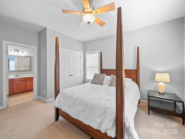 1808 Mill Chase Ln, Waxhaw, NC 28173 - bedroom featuring light colored carpet, a closet, ensuite bath, and a ceiling fan