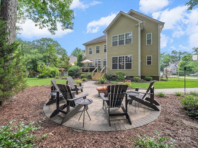 1808 Mill Chase Ln, Waxhaw, NC 28173 - view of patio with an outdoor fire pit and a wooden deck