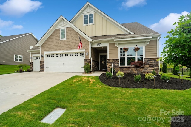 17733 Burnt Hickory Dr, Charlotte, NC 28278 - craftsman-style home featuring board and batten siding, driveway, stone siding, an attached garage, and a shingled roof