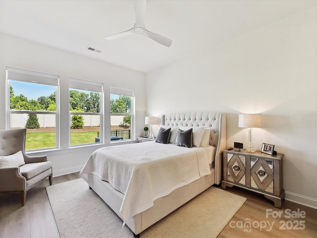 1120 Idyllic Ln, Waxhaw, NC 28173 - bedroom with wood finished floors and ceiling fan