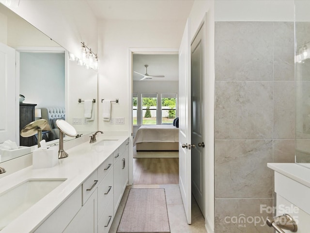 1120 Idyllic Ln, Waxhaw, NC 28173 - ensuite bathroom featuring double vanity and ceiling fan