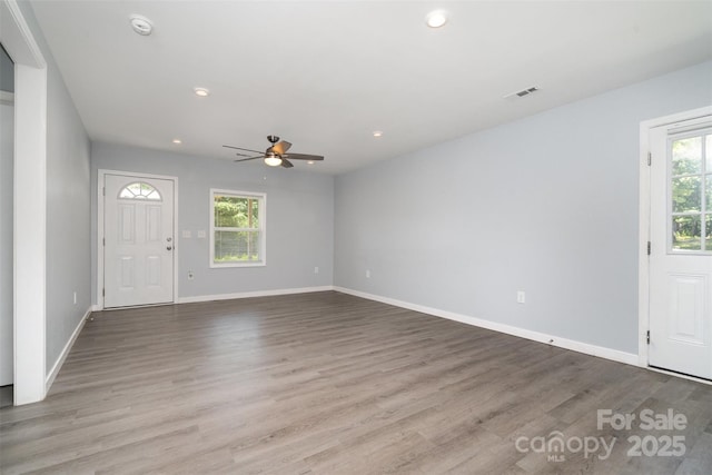 213 Pinewood Dr, Grover, NC 28073 - foyer entrance with a ceiling fan, healthy amount of natural light, wood finished floors, and recessed lighting