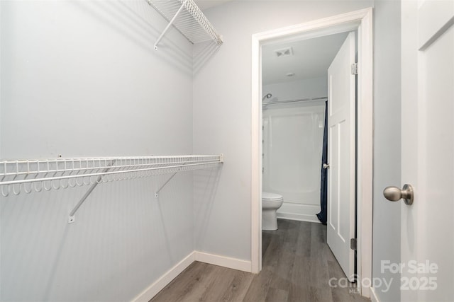 213 Pinewood Dr, Grover, NC 28073 - spacious closet featuring wood finished floors