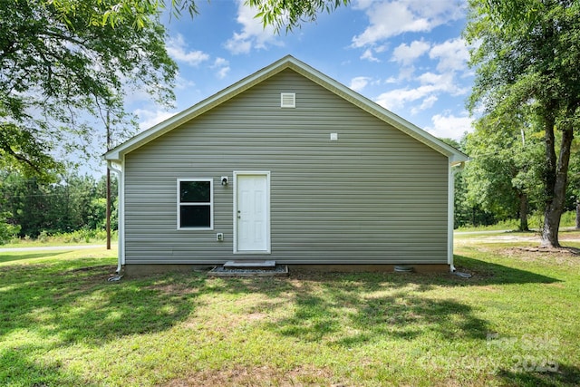 213 Pinewood Dr, Grover, NC 28073 - rear view of house with a yard