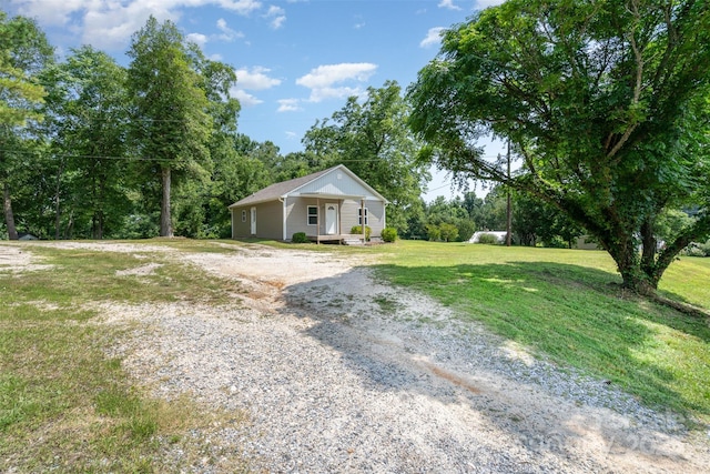 213 Pinewood Dr, Grover, NC 28073 - view of grassy yard featuring covered porch