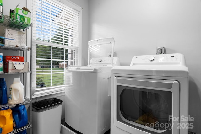 50 Isenhour Park Rd, Taylorsville, NC 28681 - washroom with washing machine and clothes dryer and plenty of natural light