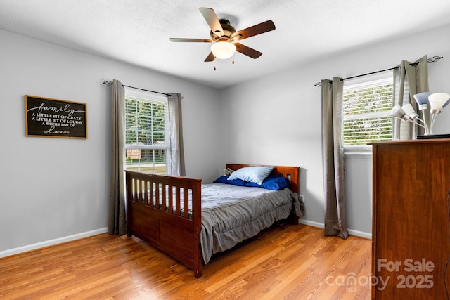 50 Isenhour Park Rd, Taylorsville, NC 28681 - bedroom featuring light wood-style flooring and a ceiling fan