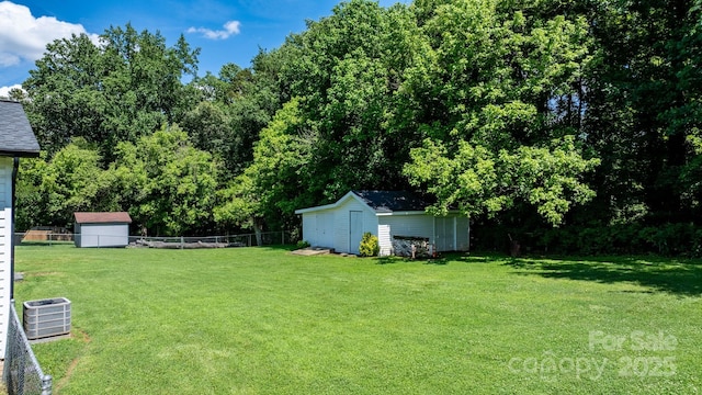 50 Isenhour Park Rd, Taylorsville, NC 28681 - fenced backyard with a storage unit