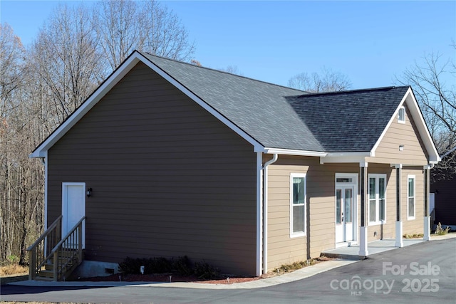 2158 Watson Rd, Lenoir, NC 28645 - view of side of home with entry steps, roof with shingles, and french doors