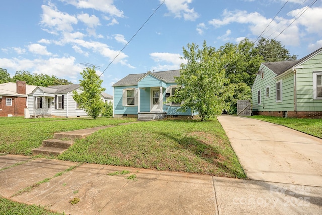 1019 Richard St, Salisbury, NC 28144 - bungalow-style house with concrete driveway, a front lawn, crawl space, and a porch