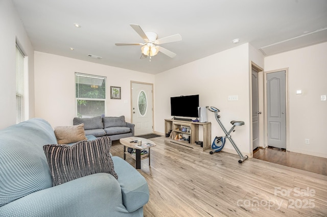 1019 Richard St, Salisbury, NC 28144 - living room featuring wood finished floors and ceiling fan