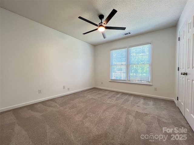 2609 Lamp Post Ln, Kannapolis, NC 28081 - carpeted spare room with ceiling fan and a textured ceiling