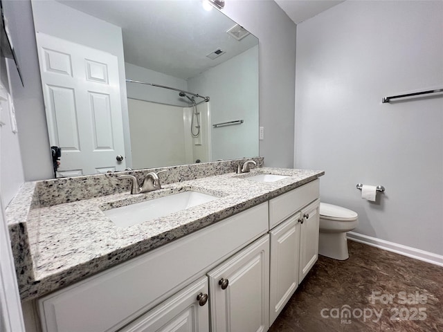 2609 Lamp Post Ln, Kannapolis, NC 28081 - bathroom featuring double vanity and a shower