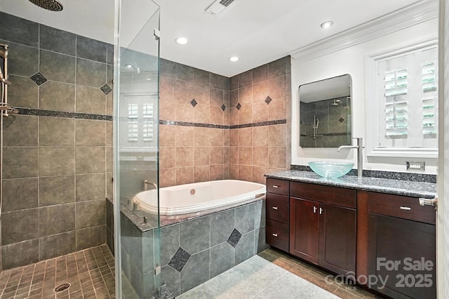 4825 Deanscroft Dr, Charlotte, NC 28226 - full bath with tile patterned flooring, a shower stall, a bath, vanity, and recessed lighting